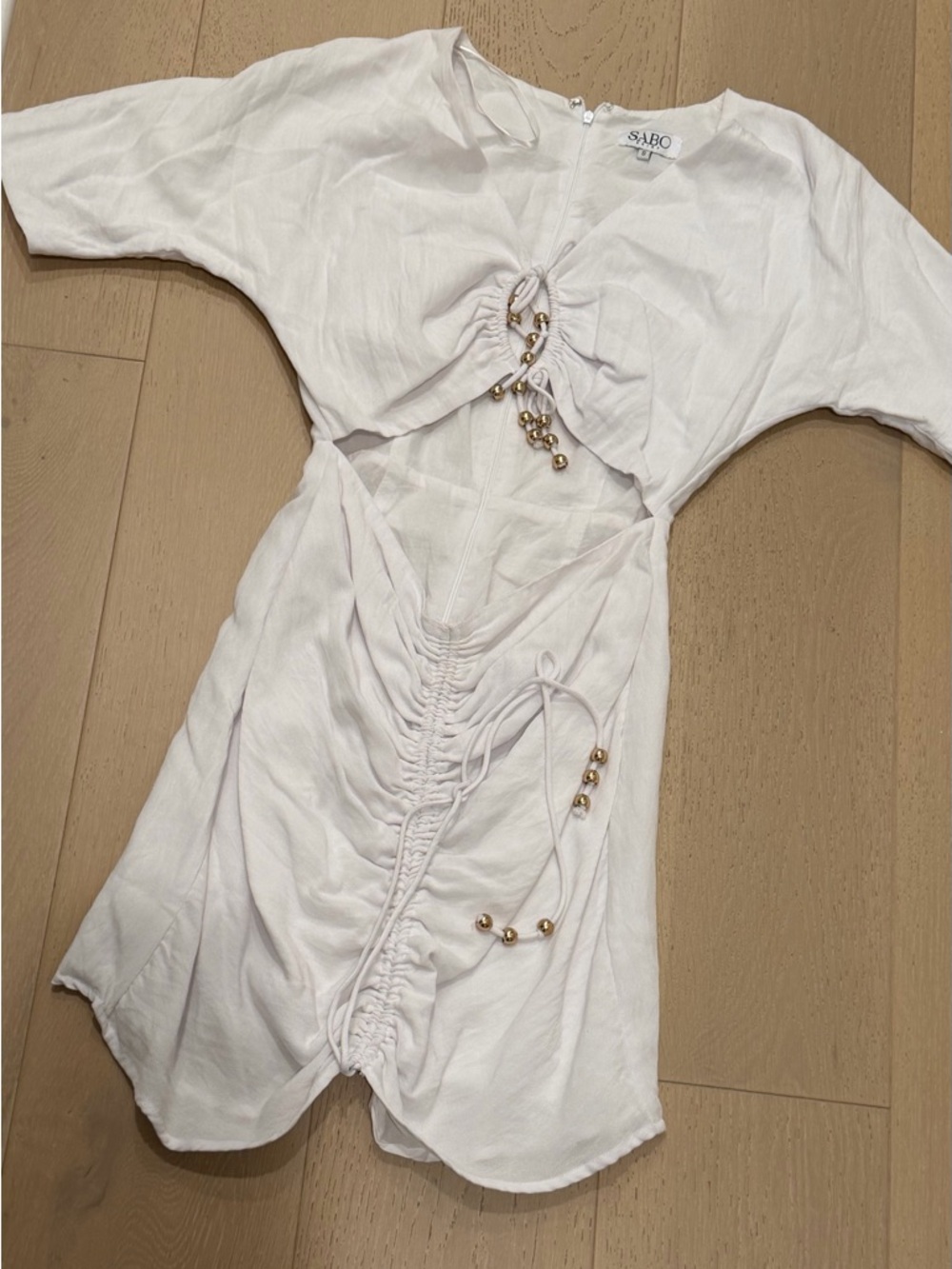 SABO White Ruched Cutout Dress with Gold Bead Details